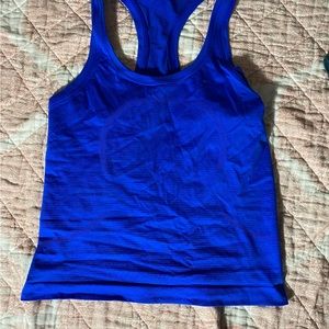 Vibrant blue swiftly tech razorback tank top in race length
